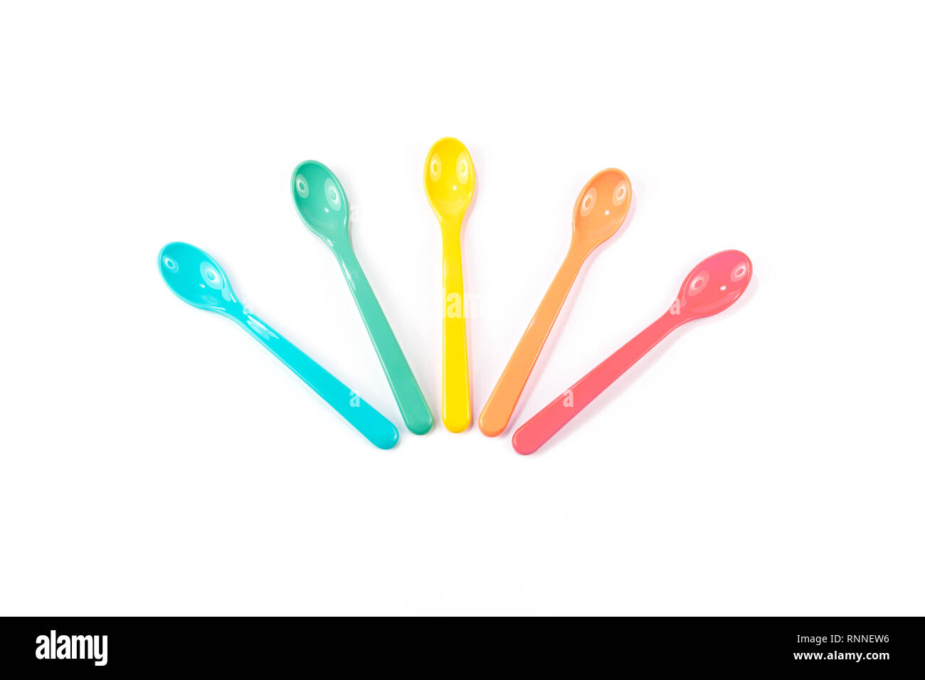 https://c8.alamy.com/comp/RNNEW6/colorful-bunch-of-plastic-baby-spoons-on-white-background-happy-food-RNNEW6.jpg
