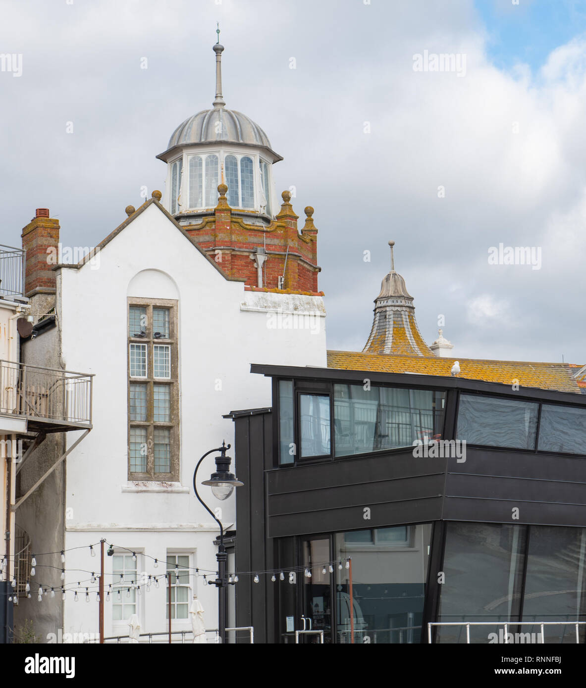 The old and new architecture of Lyme Regis Museum (The Philpot Museum) at Lyme Regis. The museum is built on the site of the home of Mary Anning. Stock Photo