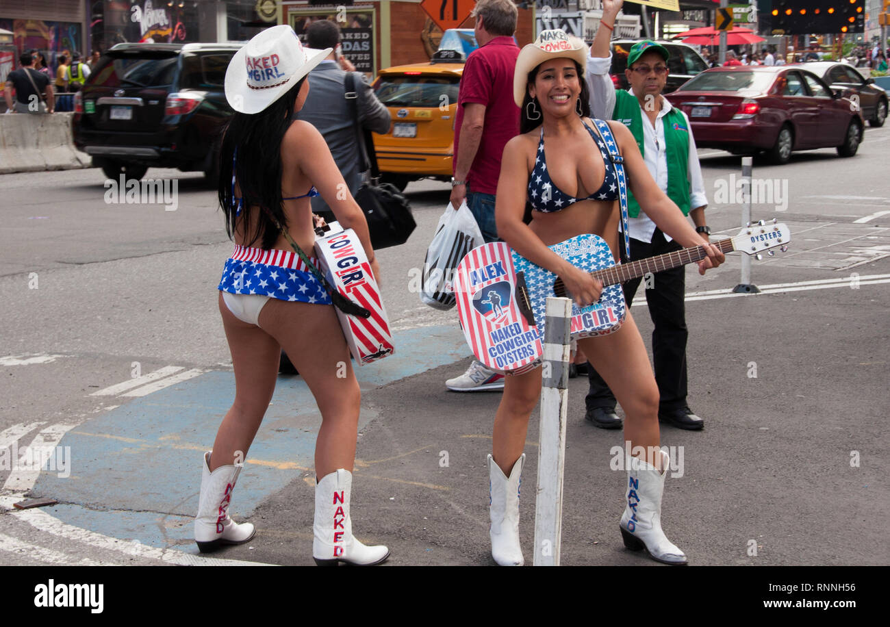 New York, USA - June 10, 2014: Naked cowgirls on Times Square in New York City USA Stock Photo