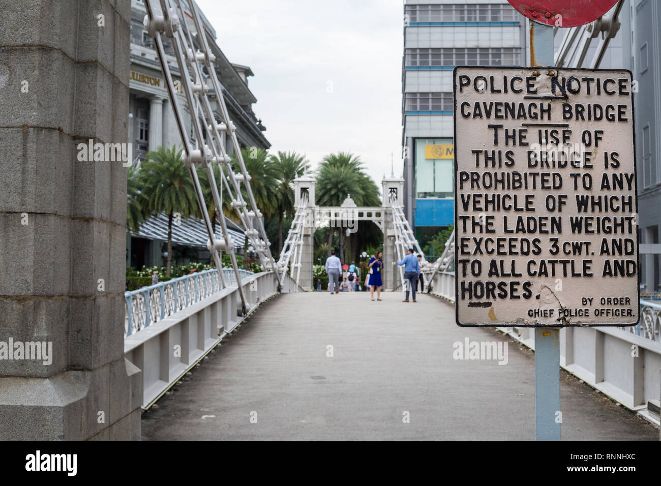 Cavenagh Bridge over Singapore River, forbidden to Cattle and Horses, Singapore. Stock Photo