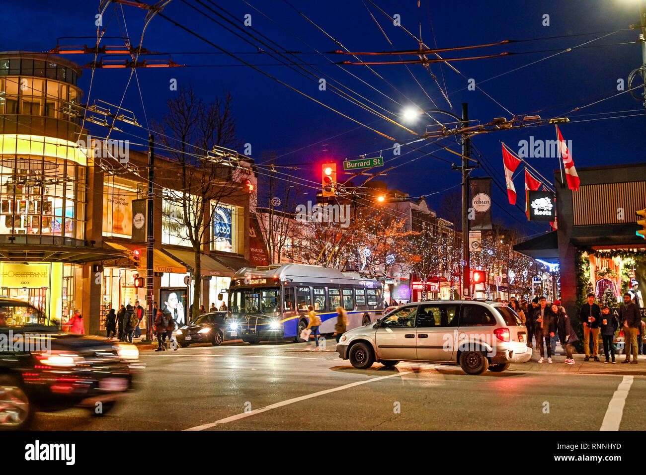 Busy night time shoppers and traffic, Robson Street, Vancouver, British  Columbia, Canada Stock Photo - Alamy