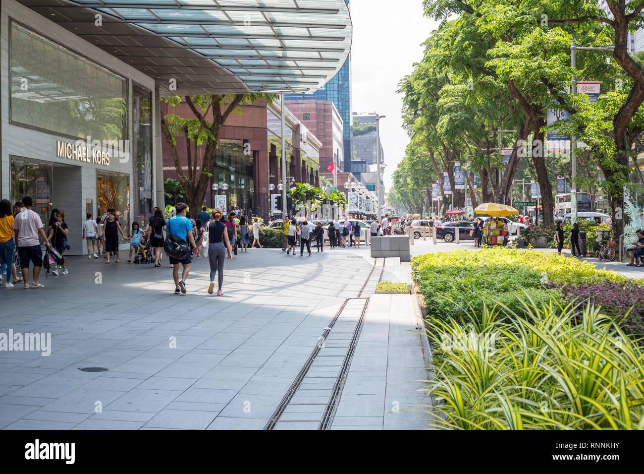 Singapore, Pedestrians in Orchard Road Street Scene. Stock Photo
