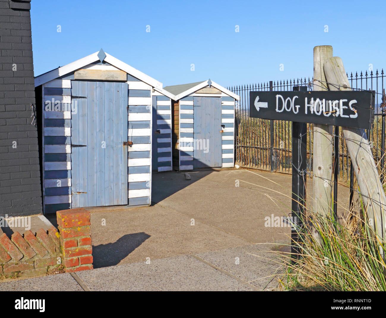 Dog houses by the beach access on the Norfolk coast at WintertononSea