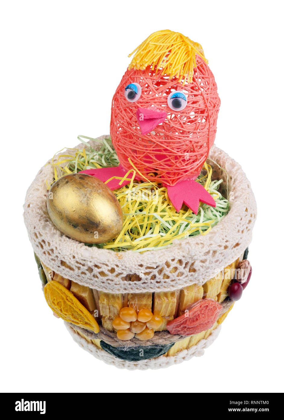 Easter handmade  wooden nest  with funny  red boy chicken and golden egg. Isolated on white studio macro shot Stock Photo