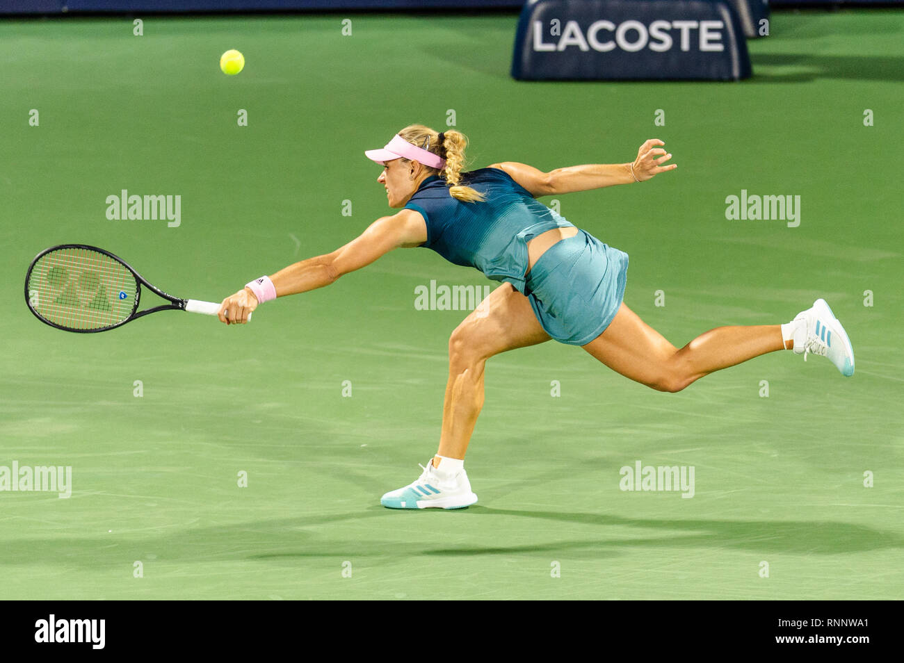 Dubai, UAE. 19th Feb, 2019. Angelique Kerber of Germany stretches for the ball in the second round match against Dalila Jakupovic of Slovenia during the Dubai Duty Free Tennis Championship at the Dubai International Tennis Stadium, Dubai, UAE on 19 February 2019. Photo by Grant Winter. Credit: UK Sports Pics Ltd/Alamy Live News Stock Photo