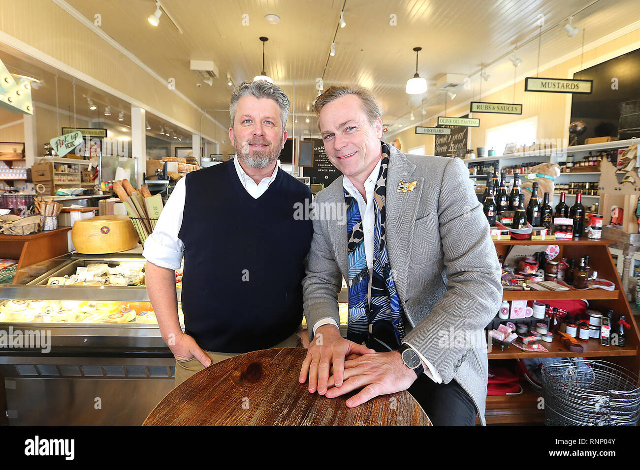 Oakville, CA, USA. 7th Feb, 2019. Jean-Charles Boisset, right, is seen with Oakville Grocery general manager Barry Dinsmore in the Oakville store that he recently purchased. Another store, located in Healdsburg, was also included in the sale. Credit: Napa Valley Register/ZUMA Wire/Alamy Live News Stock Photo