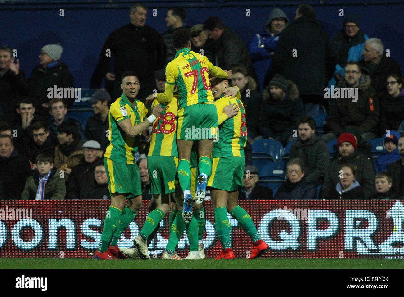 London, UK. 19th Feb, 2019. Jefferson Montero of West Bromwich Albion celebrates with his teammates after scoring his team's first goal. EFL Skybet championship match, Queens Park Rangers v West Bromwich Albion at Loftus Road Stadium in London on Tuesday 19th February 2019.  this image may only be used for Editorial purposes. Editorial use only, license required for commercial use. No use in betting, games or a single club/league/player publications. pic by Steffan Bowen/Andrew Orchard sports photography/Alamy Live news Credit: Andrew Orchard sports photography/Alamy Live News Stock Photo