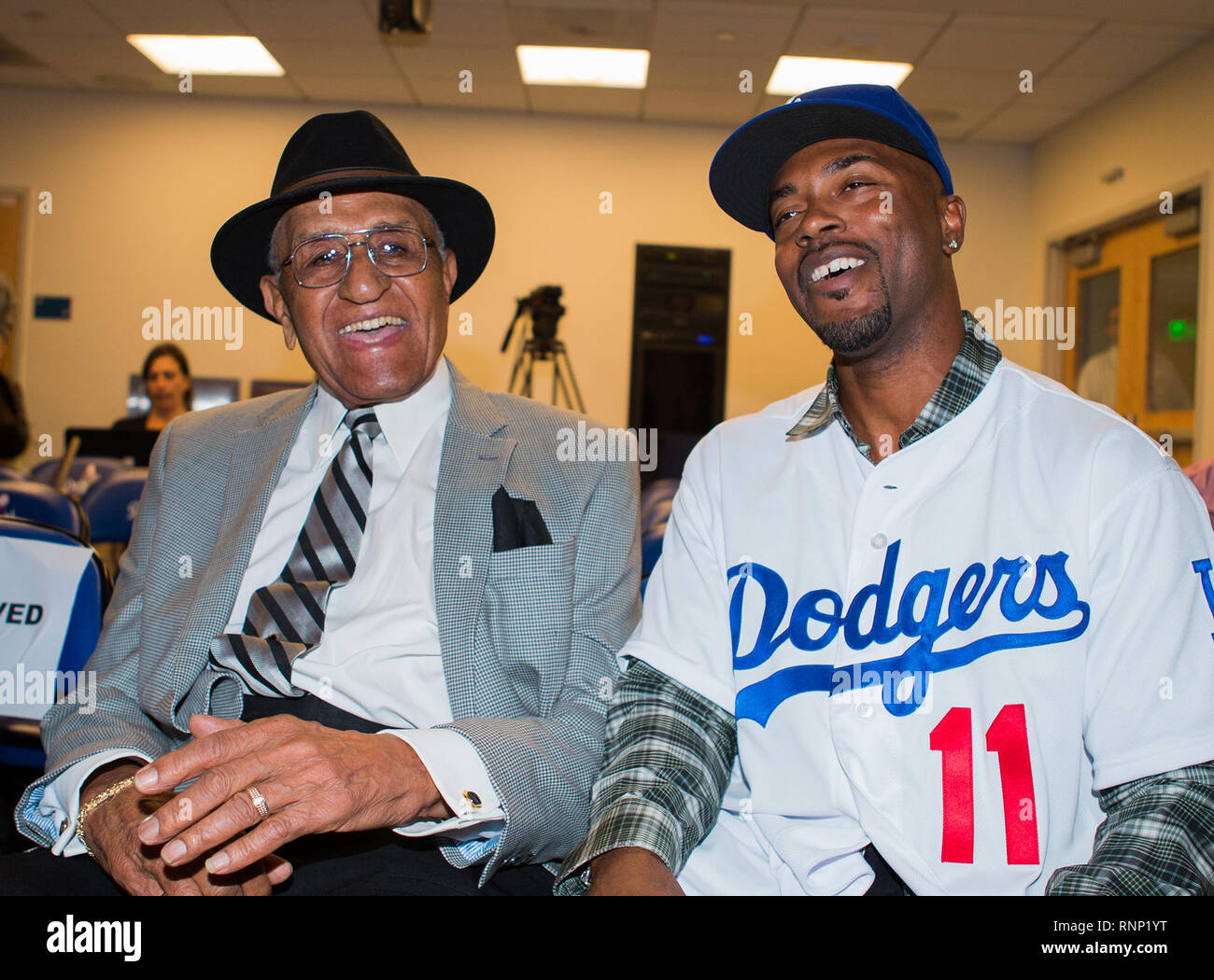 Los Angeles, CA, USA. 7th Jan, 2015. Jimmy Rollins has a laugh with former Dodger NL MVP and Cy Young award winner Don Newcombe after his introductory press conference held at Dodger Stadium in Los Angeles, California. (Mandatory Credit: Juan Lainez/MarinMedia.org/Cal Sport Media) (Complete photographer, and credit required) Credit: csm/Alamy Live News Stock Photo