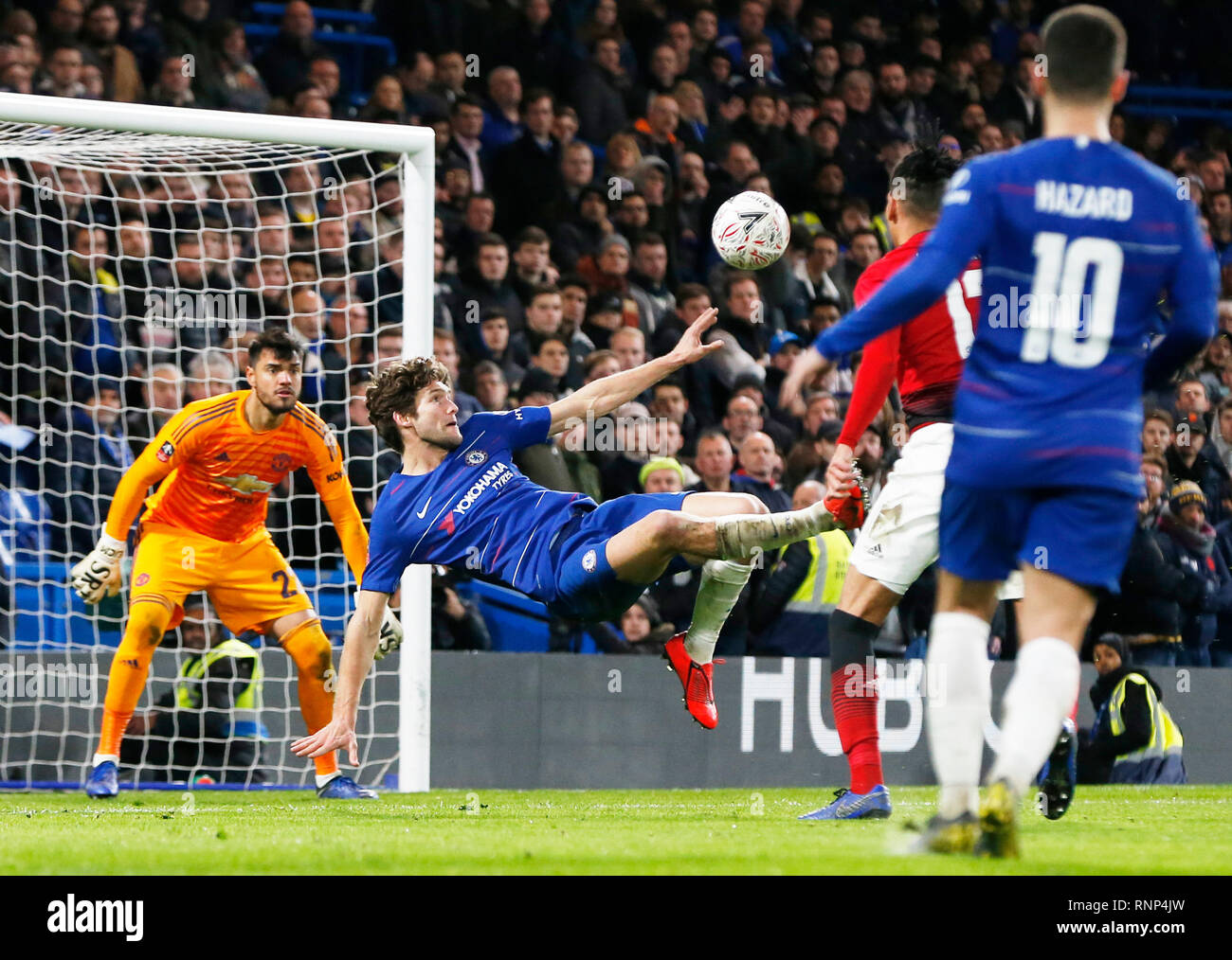 Beijing, China. 18th Feb, 2019. Chelsea's Marcos Alonso (2nd L) makes a bicycle kick during the FA Cup fifth round match between Chelsea and Manchester United in London, Britain on Feb. 18, 2019. Manchester United won 2-0. Credit: Han Yan/Xinhua/Alamy Live News Stock Photo