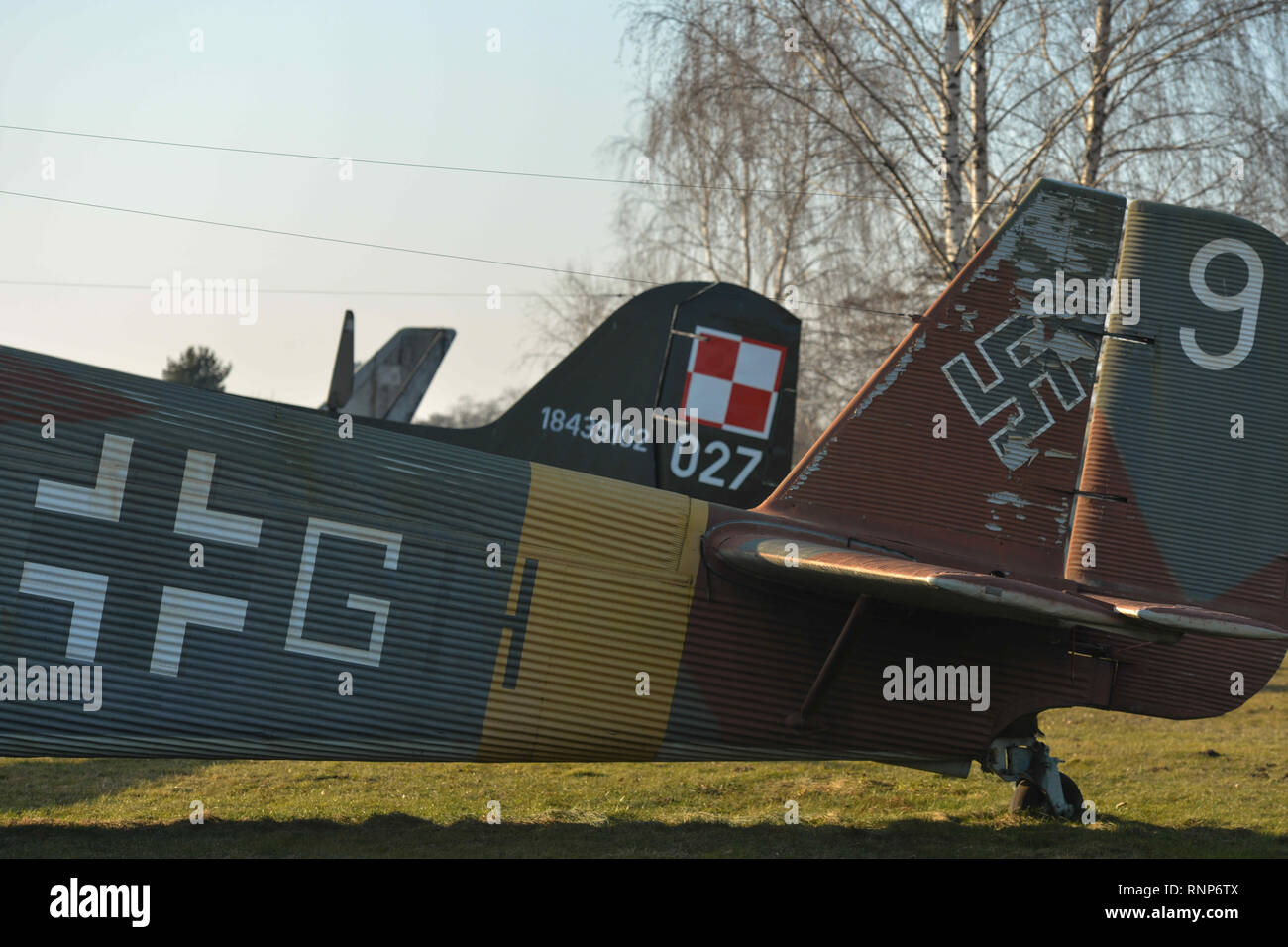 February 19, 2019 - Krakow, Malopolski Province, Poland - The Balkenkreuz, a straight-armed cross insignia seen painted on the Junkers Ju 52 and the Polish Air Force checkerboard on the background..The Polish Aviation Museum is located at the site of the former Krakow-Rakowice-Czyzyny Airport, established in 1912, one of the oldest in the world. The Museum collection consists of over 200 aircraft, dating WW1, WW2 and a collection of all airplane types developed or used by Poland after 1945. (Credit Image: © Cezary Kowalski/SOPA Images via ZUMA Wire) Stock Photo