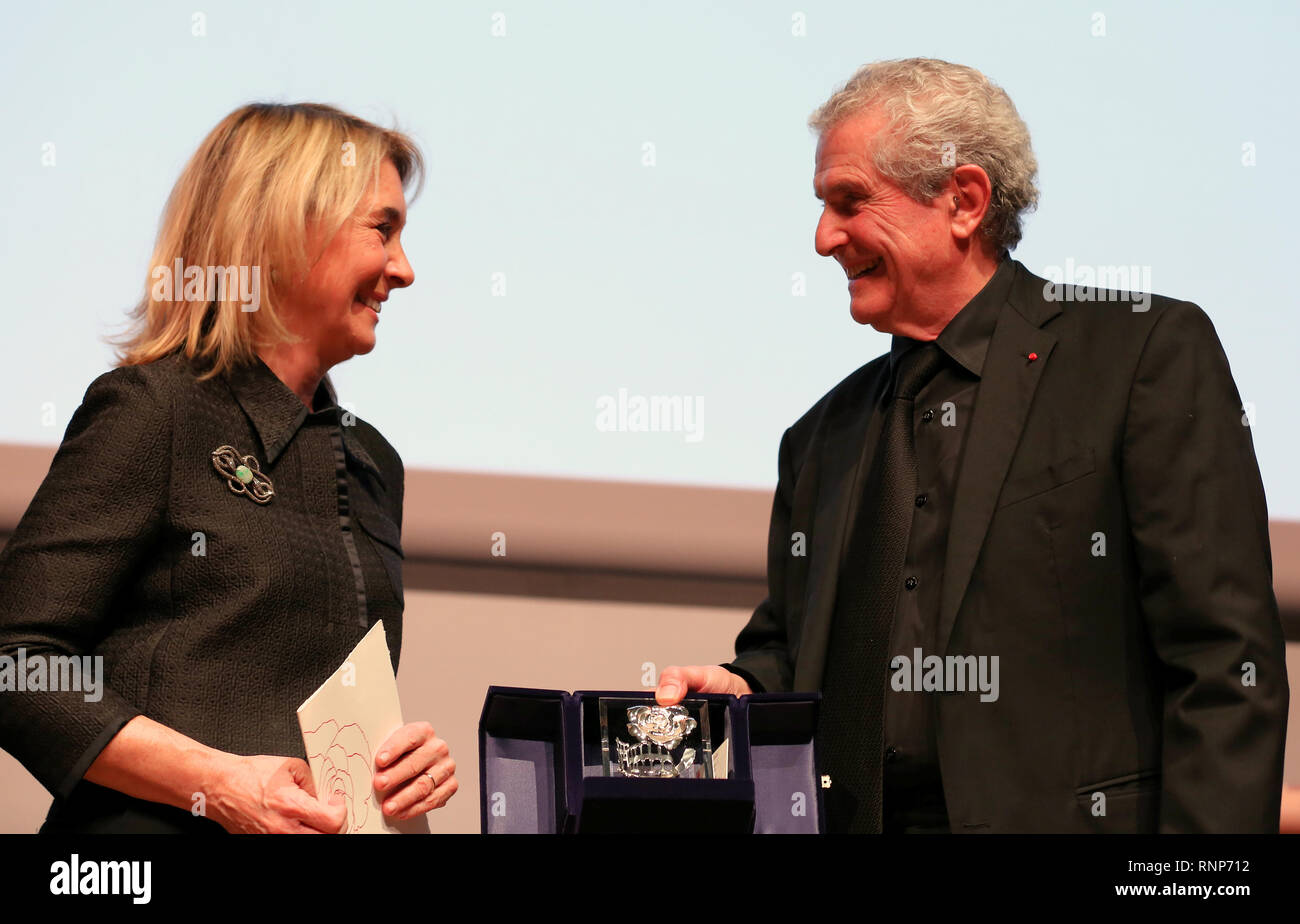 Verone, Italy. 19th Feb 2019. Oscar-winning filmmaker Claude Lelouch greated by festival's artistic director Paolo Romano onstage Credit: Mickael Chavet/Alamy Live News Stock Photo