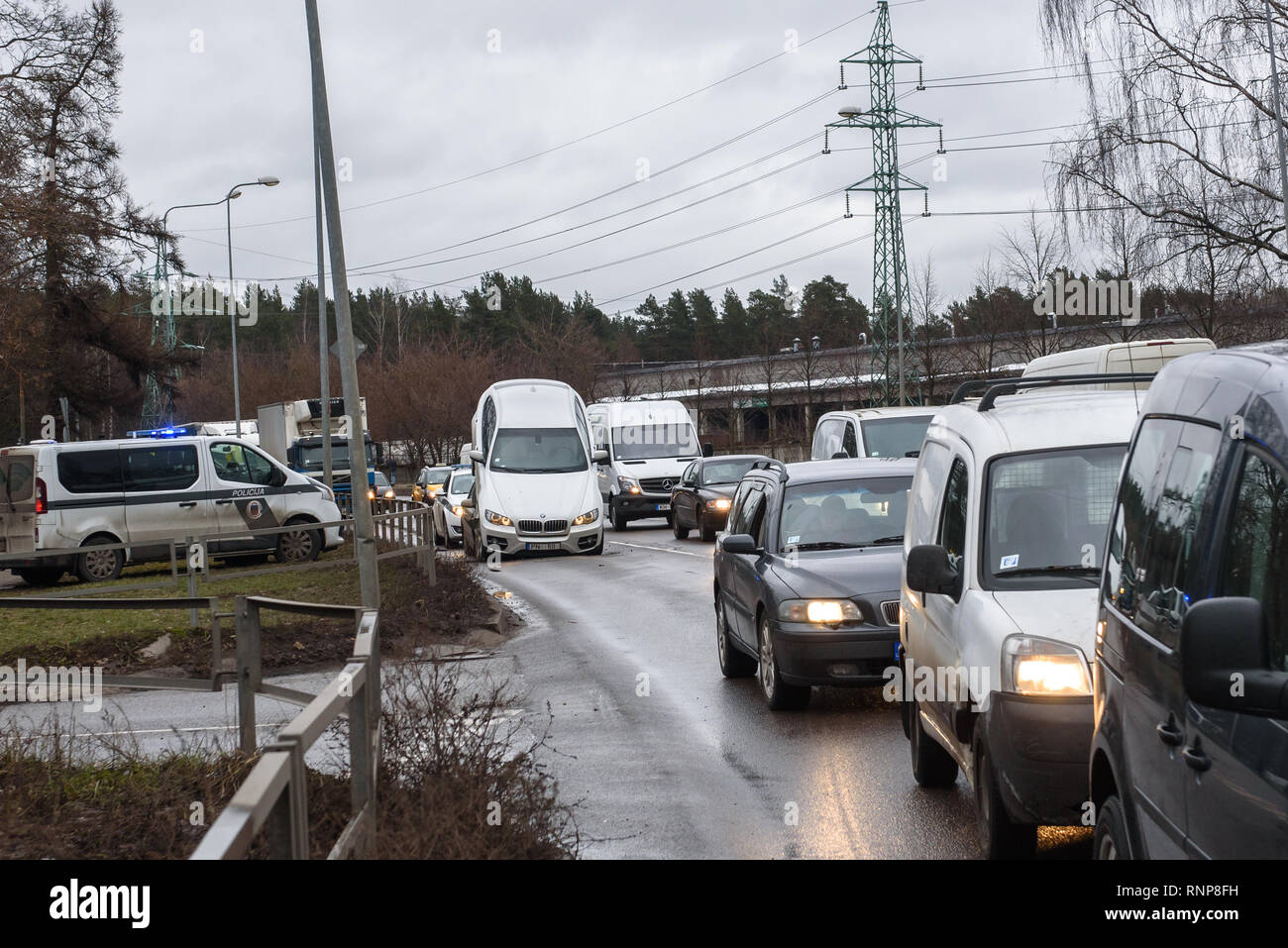 Riga, Latvia. 20th Feb 2019. Car accident - BMW and Hyundai. Strange situation, BMW car is on the roof on Hyundai car. Possibly BMW was a stolen car. Credit: Gints Ivuskans/Alamy Live News Stock Photo
