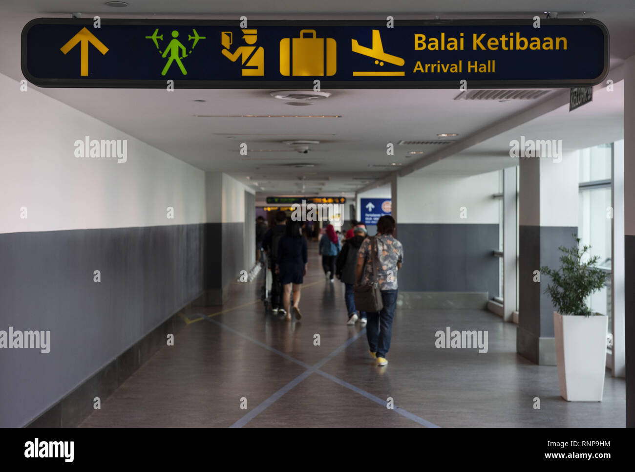 Hong Kong. 17th Feb, 2019. A sign post is seen at Kuala Lumpur  International Airport giving direction of the location of the immigration  control, luggage belts and arrival hall. Credit: Miguel Candela/SOPA