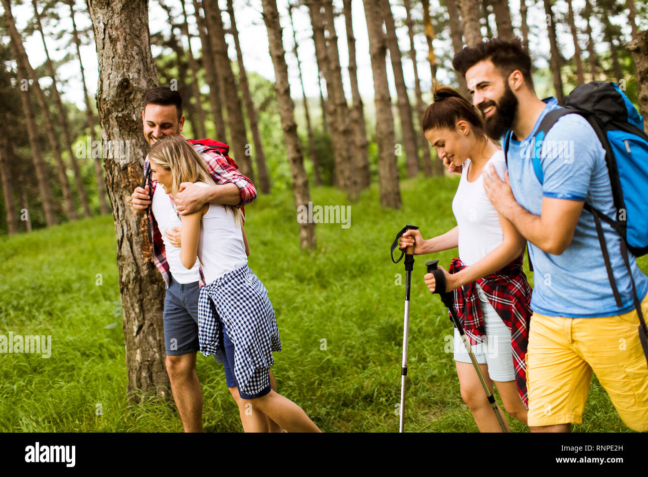Four friends hiking through hi-res stock photography and images - Alamy
