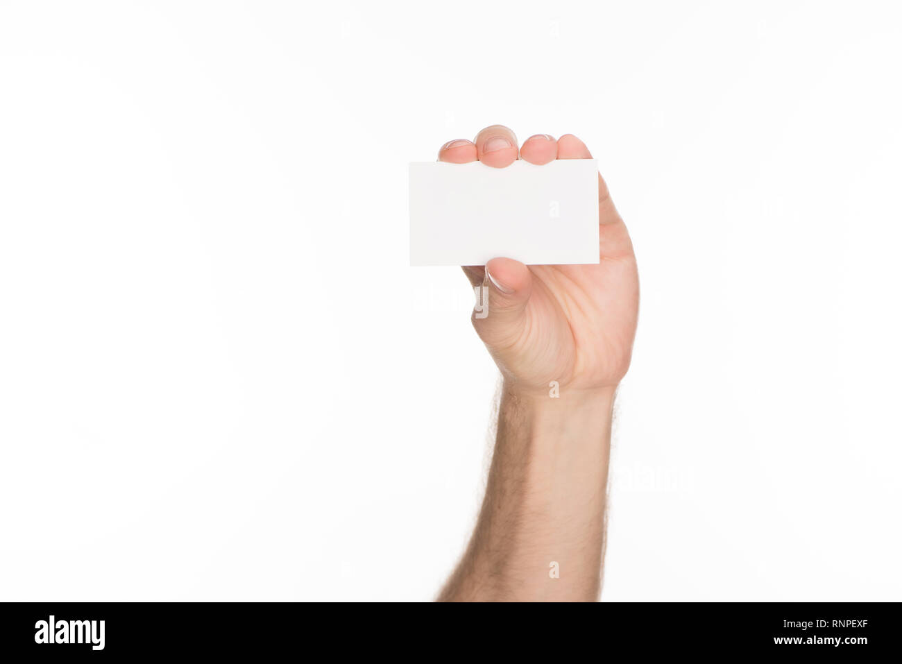 partial view of man holding blank and empty card with copy space Stock Photo