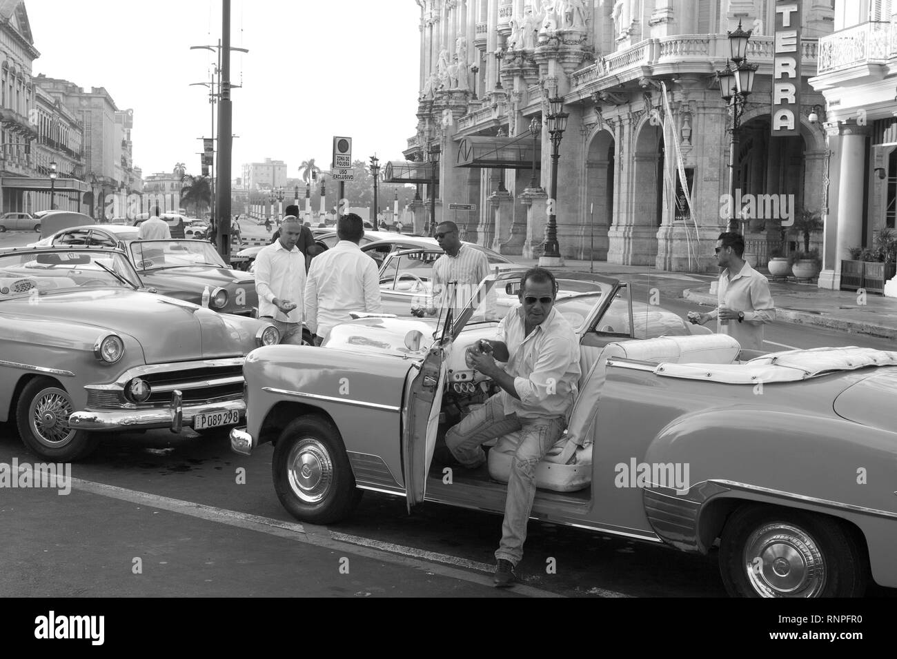 Taxi drivers waiting for tourists in central Havana Cuba Stock Photo