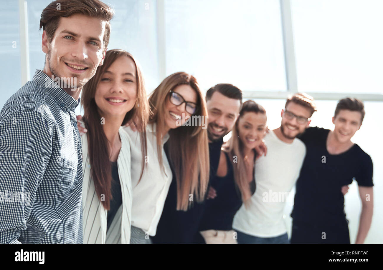 group of successful young people standing in the office Stock Photo - Alamy