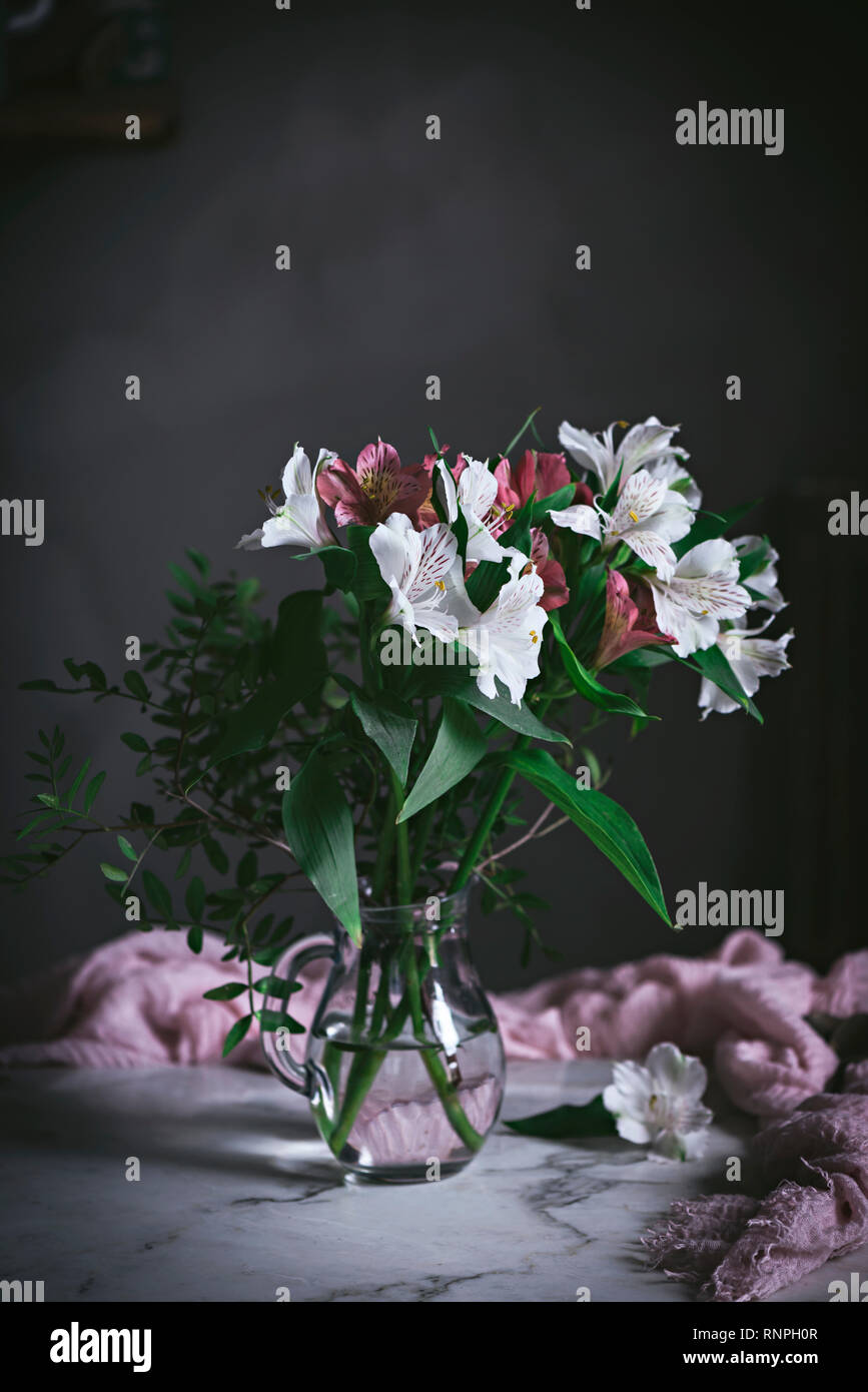 Jar of flower on table Stock Photo