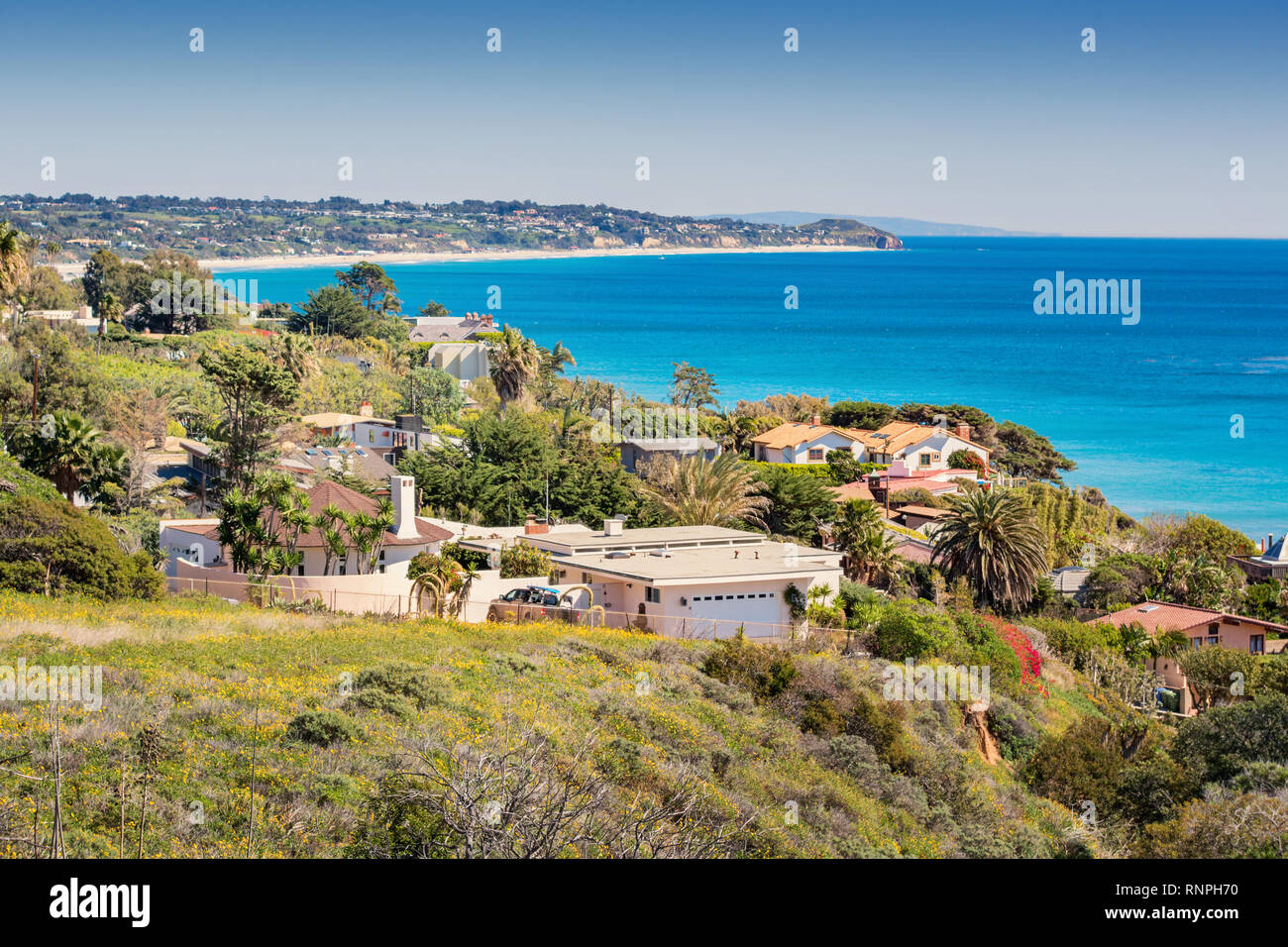 Houses in Malibu, California, USA with the Pacific Ocean in the background. Stock Photo