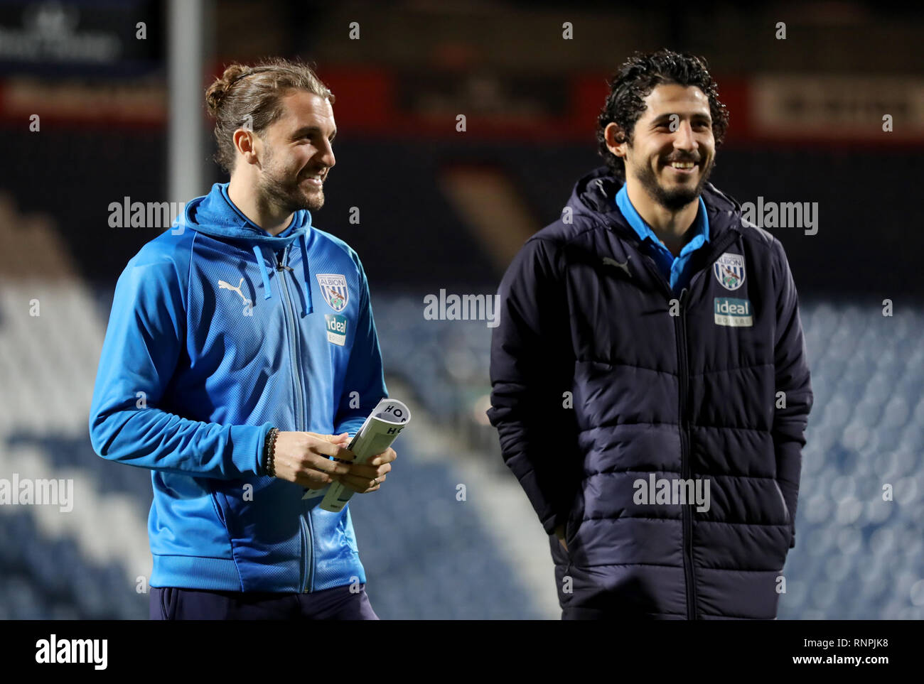 West Bromwich Albion's Jay Rodriguez (left) and Ahmed El-Sayed Hegazi (right) check out the pitch ahead of the Sky Bet Championship match at Loftus Road, London. Stock Photo
