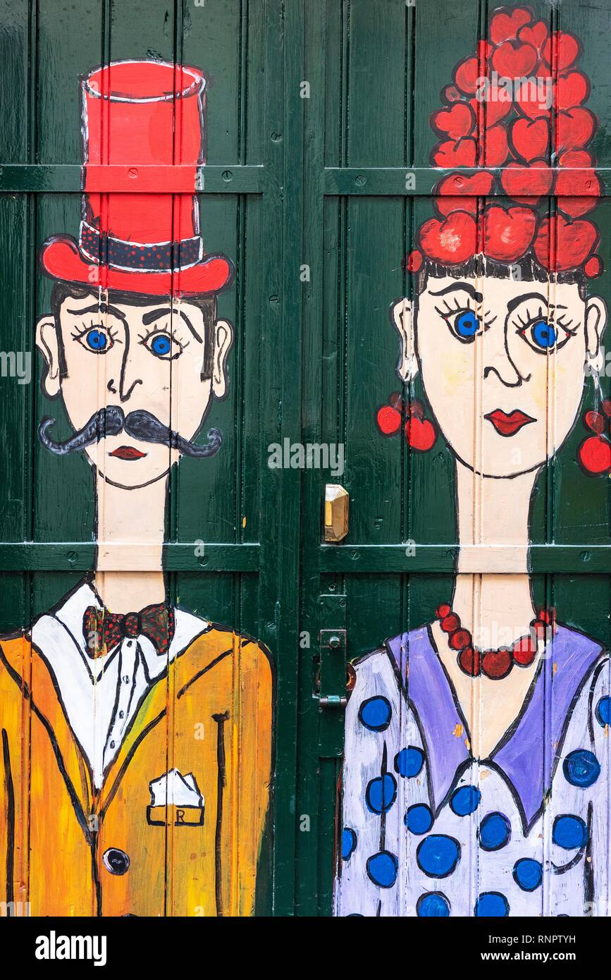 Woman and man, artfully painted front door, painting, street art, Funchal, Madeira, Portugal Stock Photo