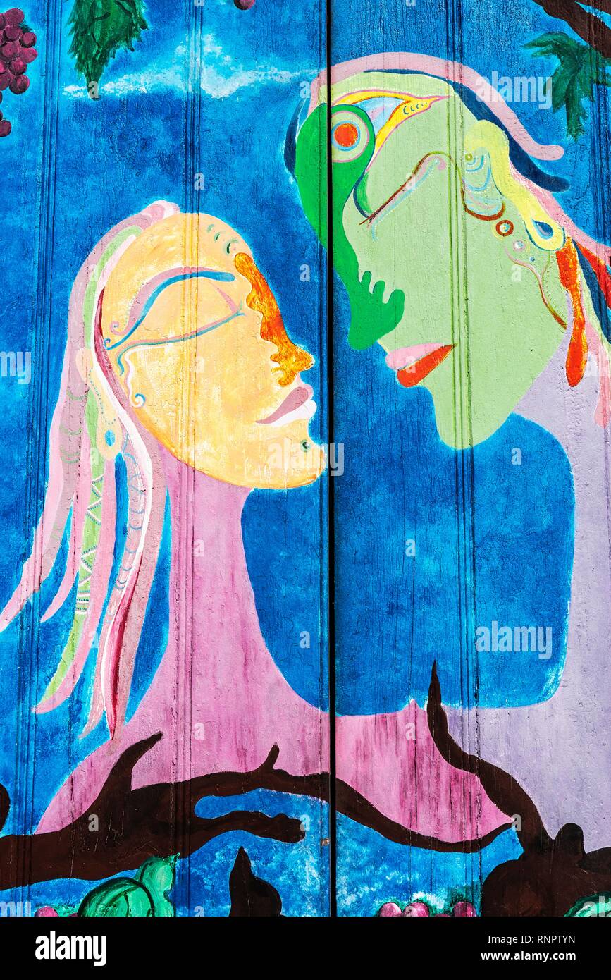 Woman and man, portrait, artfully painted front door, painting, street art, Funchal, Madeira, Portugal Stock Photo