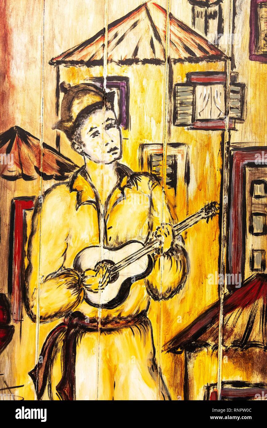 Musician with Portuguese guitar, artfully painted front door, painting, street art, Funchal, Madeira, Portugal Stock Photo