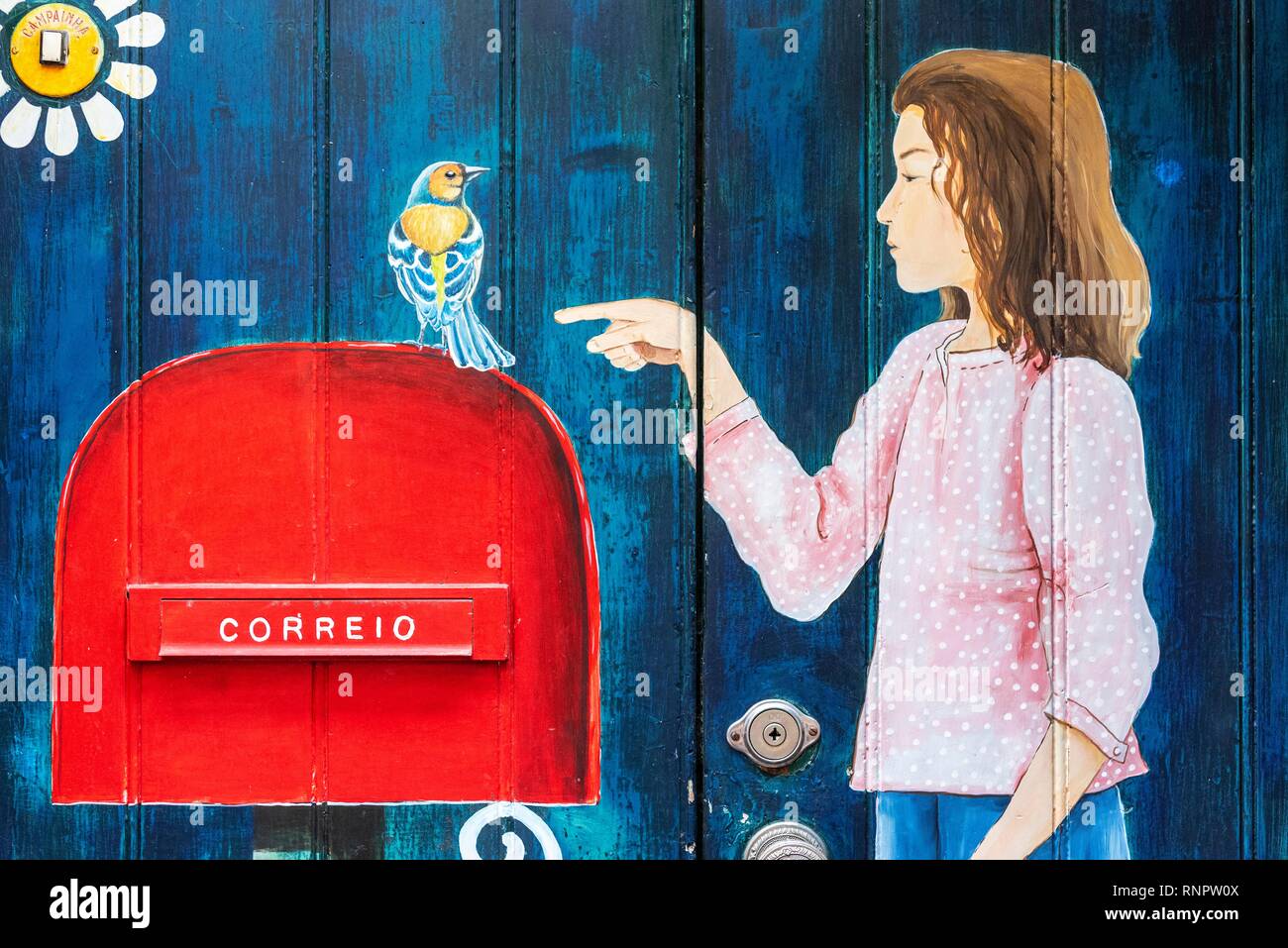 Young girl and bird, letterbox, artfully painted front door, painting, street art, Funchal, Madeira, Portugal Stock Photo