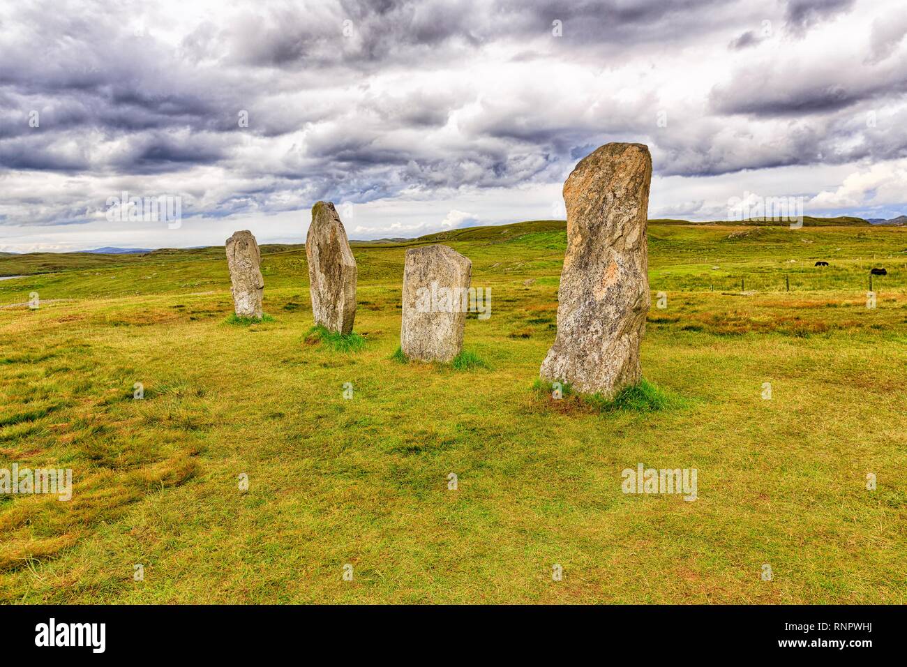 Megalith Stone Formation Callanish Standing Stones, Stone Circle under a Cloudy Sky, Lewis and Harris Island, Outer Hebrides Stock Photo