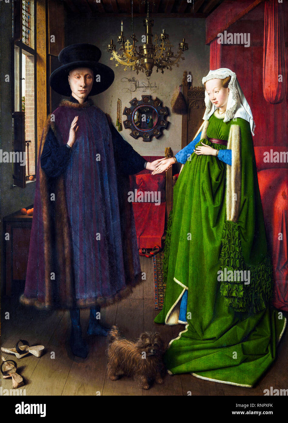 The Arnolfini Portrait or Portrait of Giovanni Arnolfini and his Wife by Flemish artist Jan Van Eyck, painting in oil on oak panel, 1434 Stock Photo