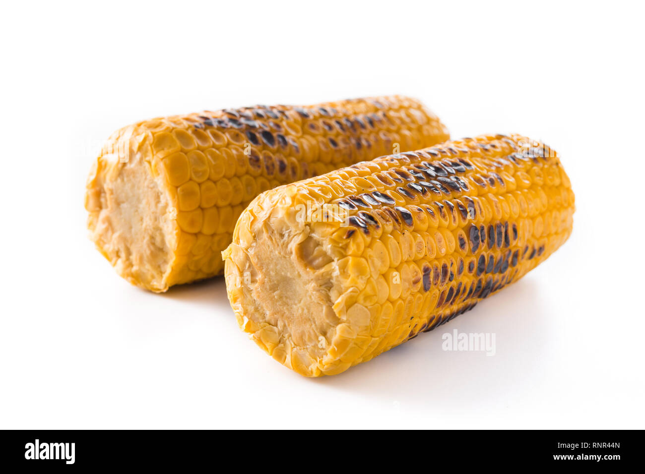 Grilled sweet corn isolated on white background. Stock Photo