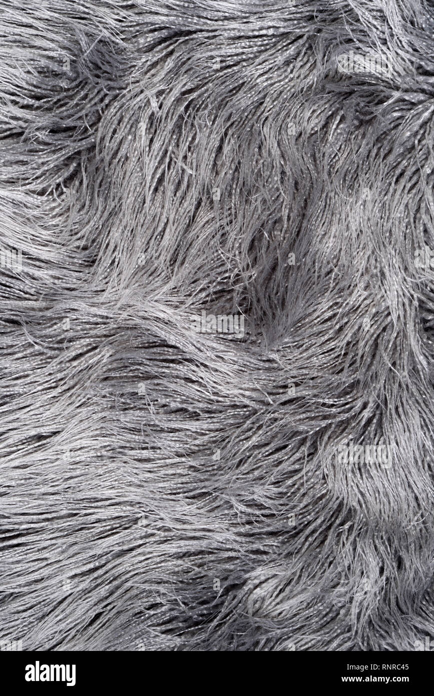 silver grey faux long fur rug Stock Photo Alamy