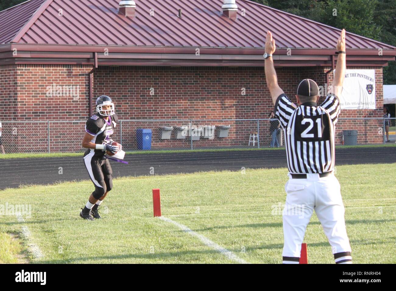 American high school football player in Virginia secures a long pass