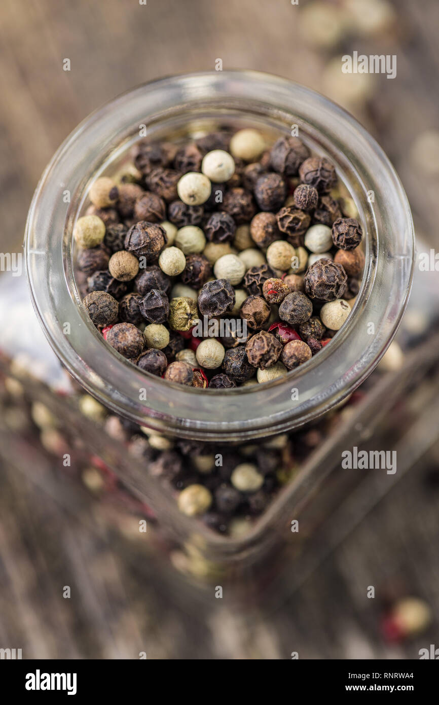 Different types of dried peppercorn in jar Stock Photo Alamy