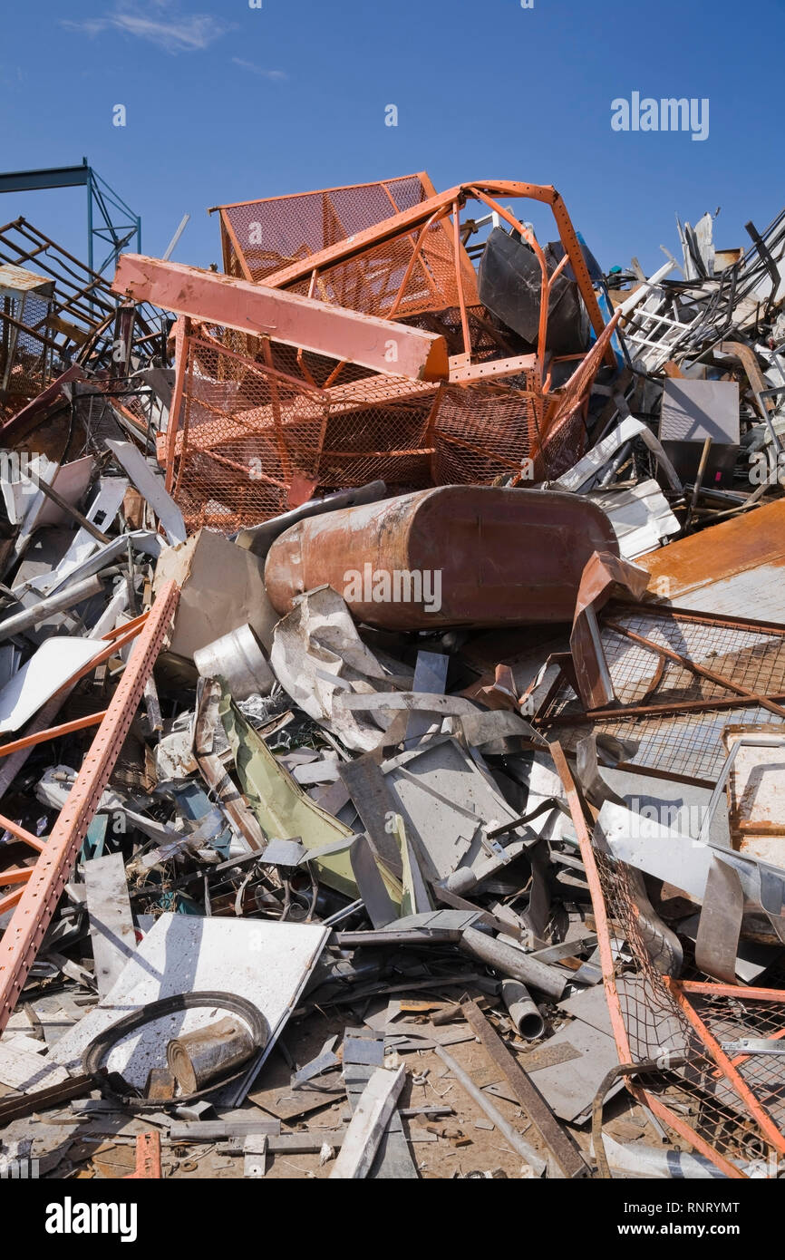 Pile of discarded metal items at a scrap metal recycling yard Stock Photo