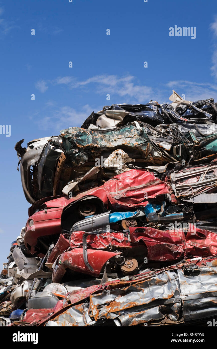 Scrap metal junkyard crushed automobiles hires stock photography and