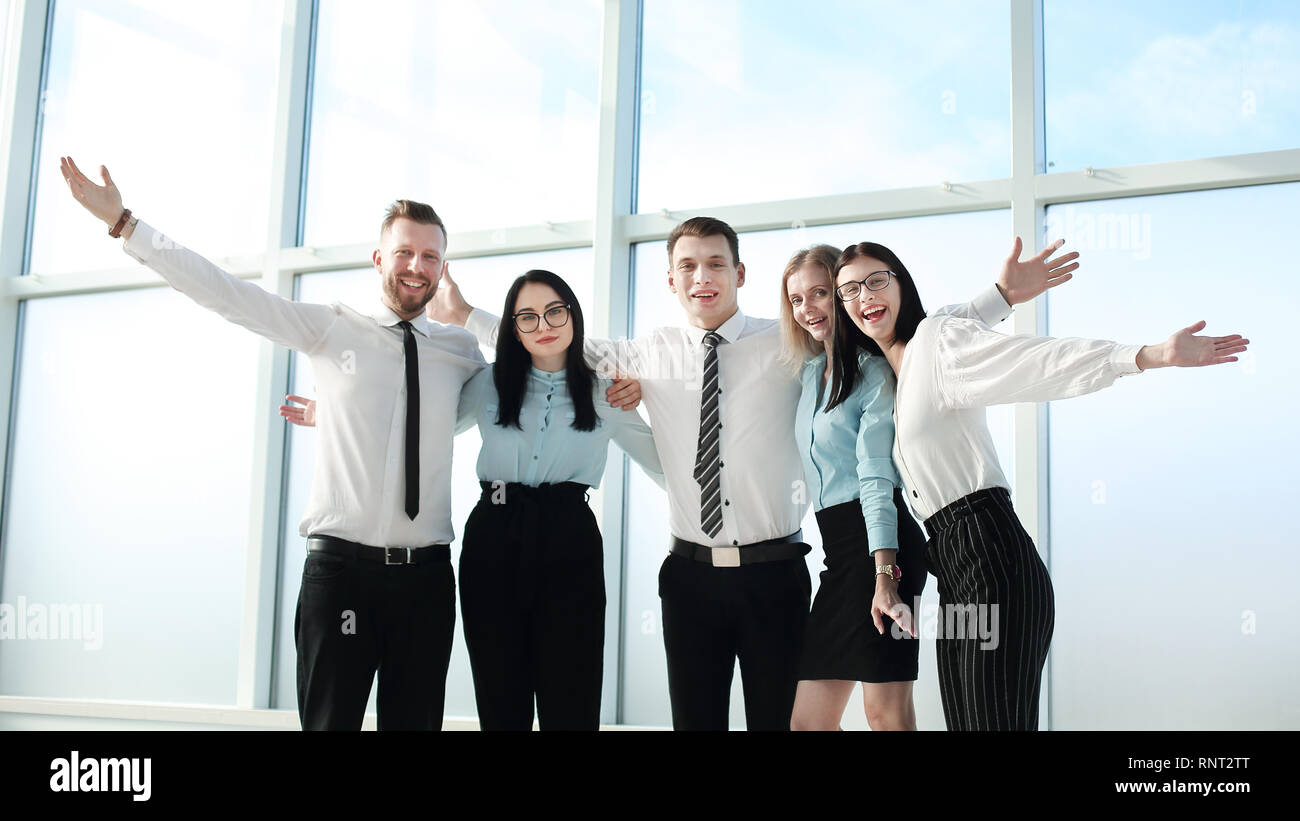 successful business team standing near the office window Stock Photo ...