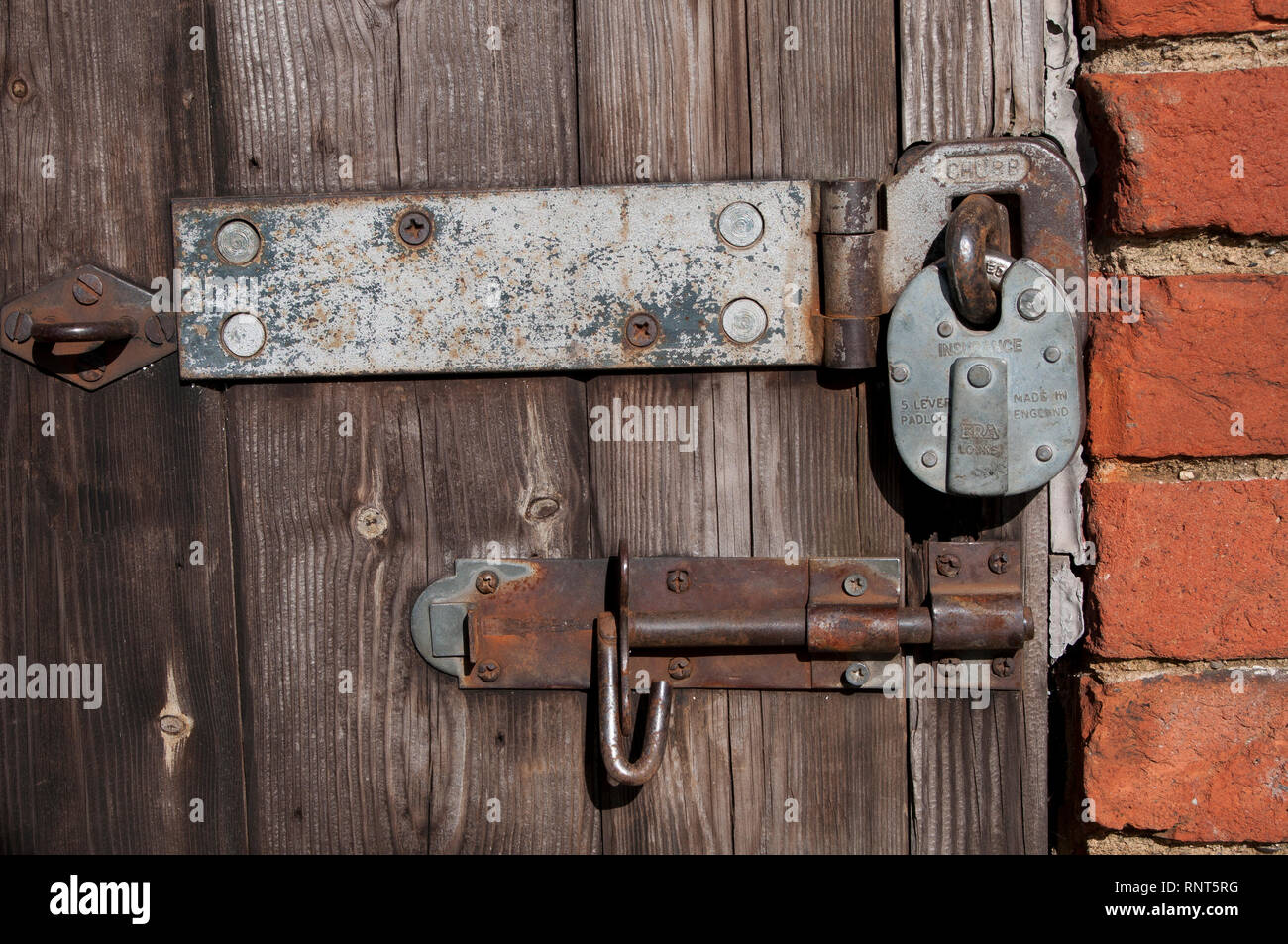 Padlocked door with bolt. Secure Stock Photo Alamy