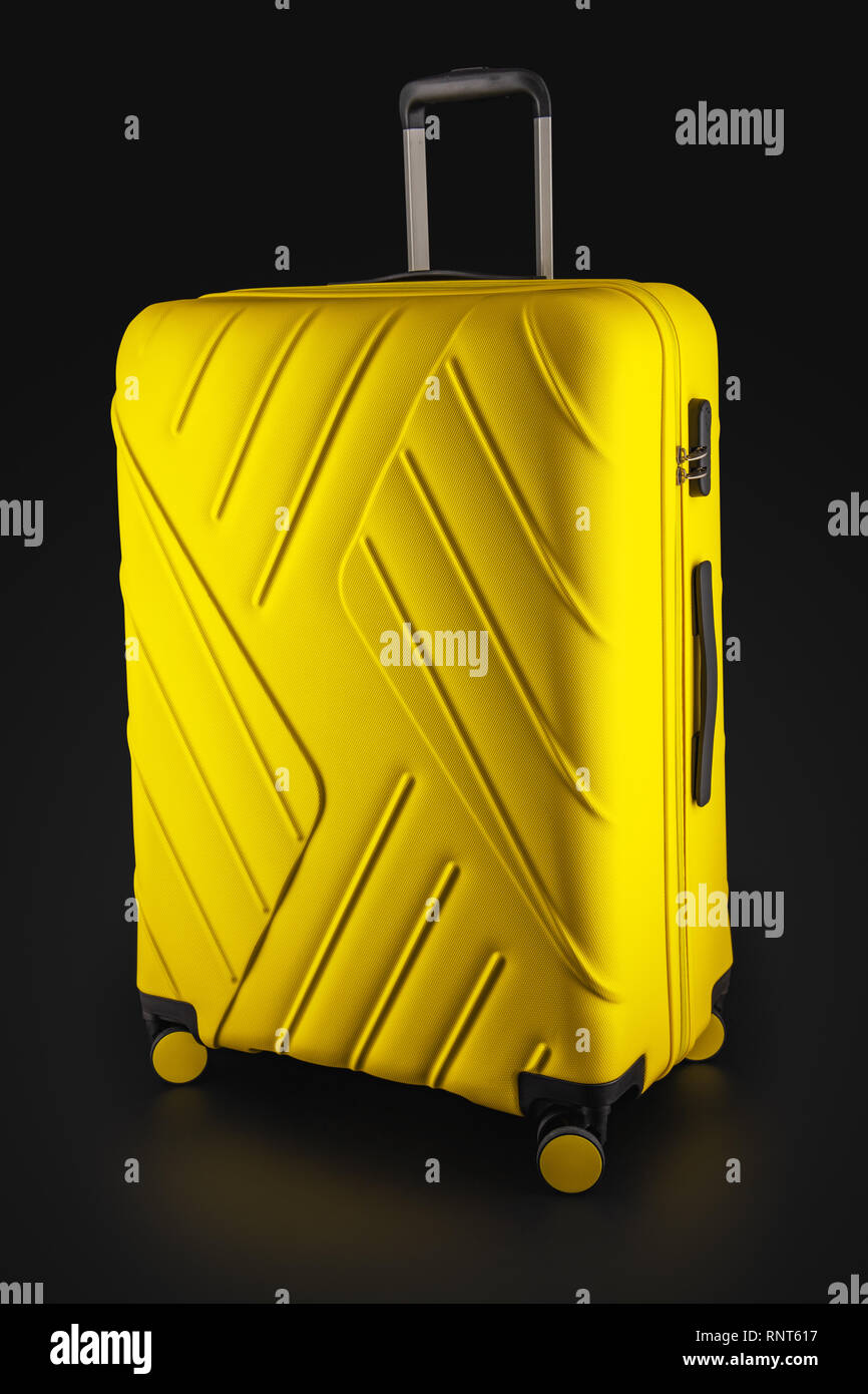 black and yellow luggage