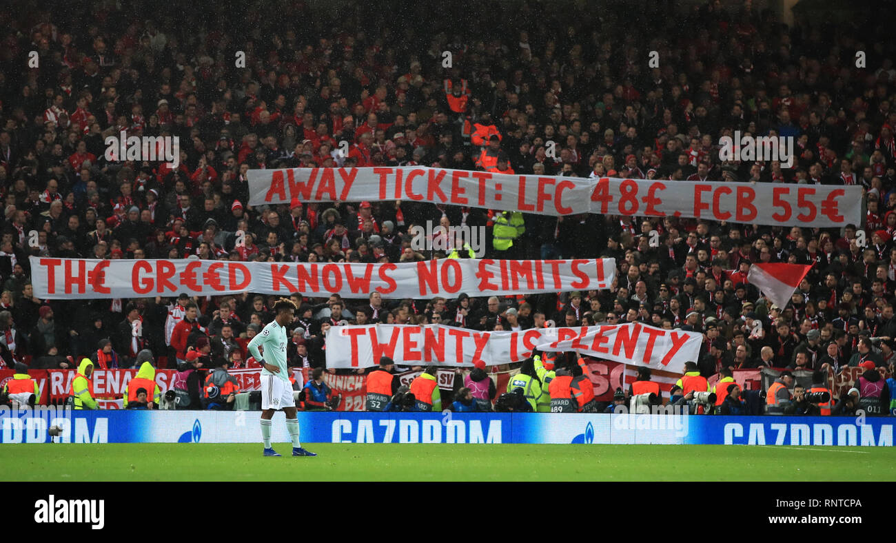 Bayern Munich fans hold up banners in protest against away ticket prices during the UEFA Champions League round of 16 first leg match at Anfield, Liverpool. Stock Photo