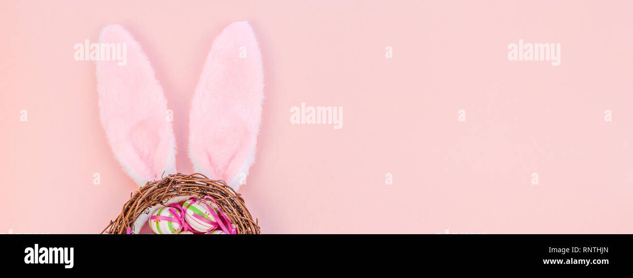 Creative Top view flat lay holiday composition Easter eggs bunny ears ...