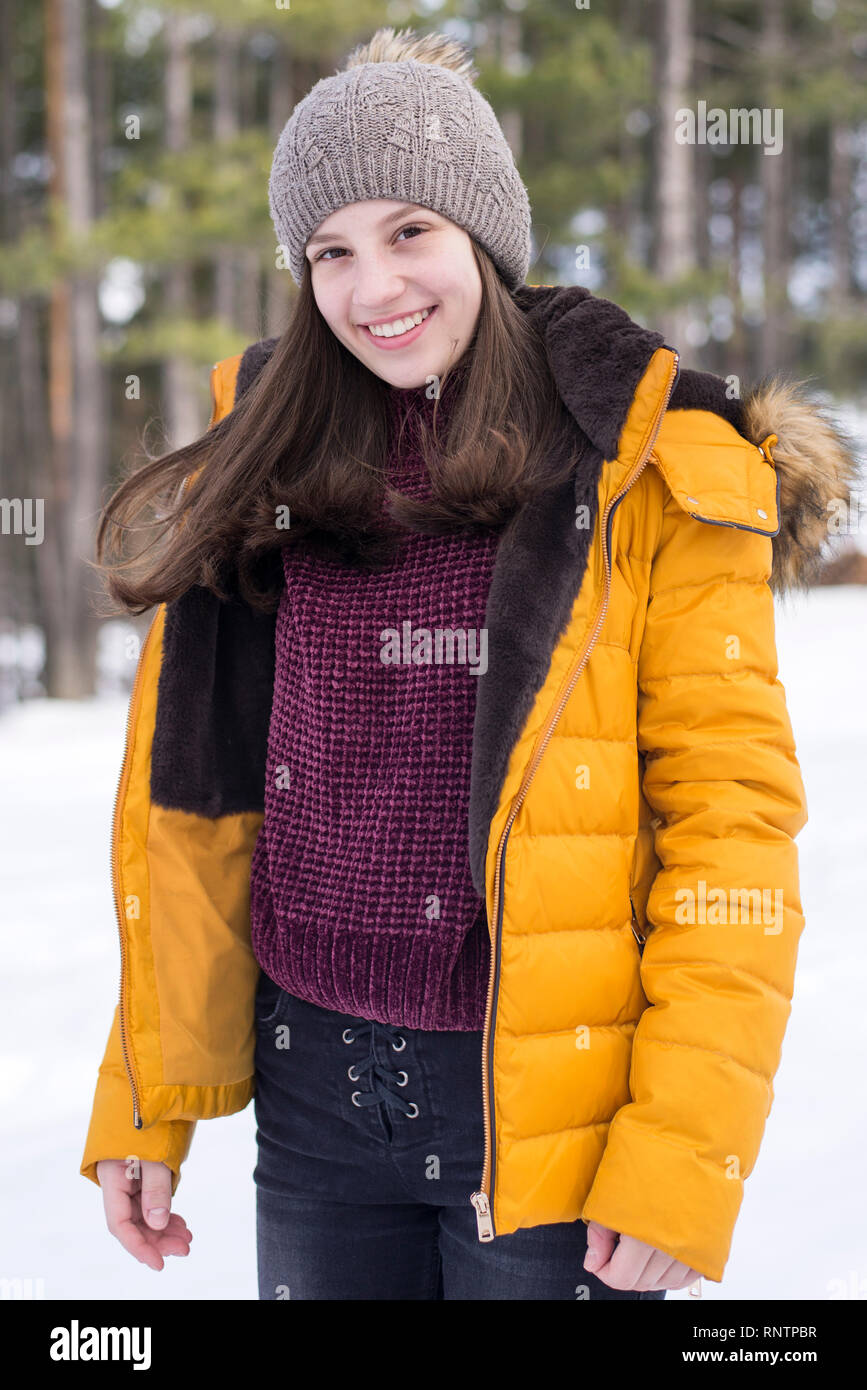 Beautiful girl in yellow jacket modeling Stock Photo Alamy