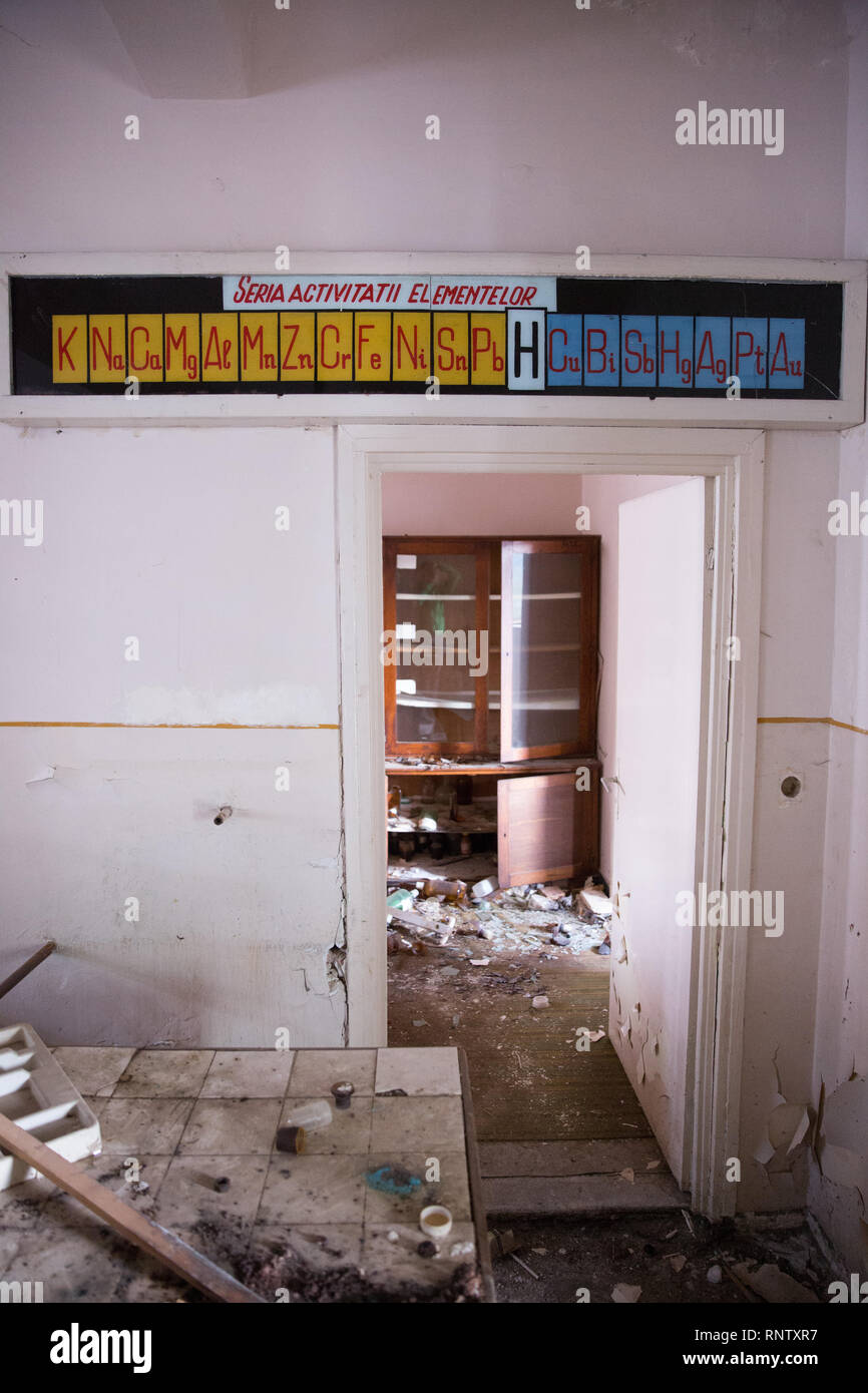 A periodic table of elements in Romanian hangs above a doorway inside of an  abandoned chemistry classroom in Sinia, Romania Stock Photo - Alamy