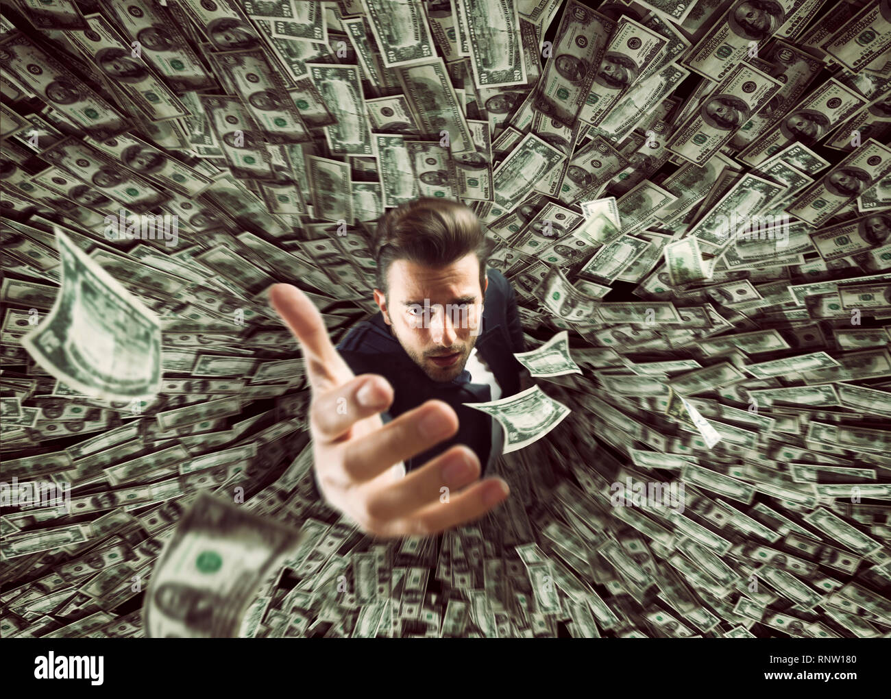 Businessman swallowed by black hole of money Stock Photo