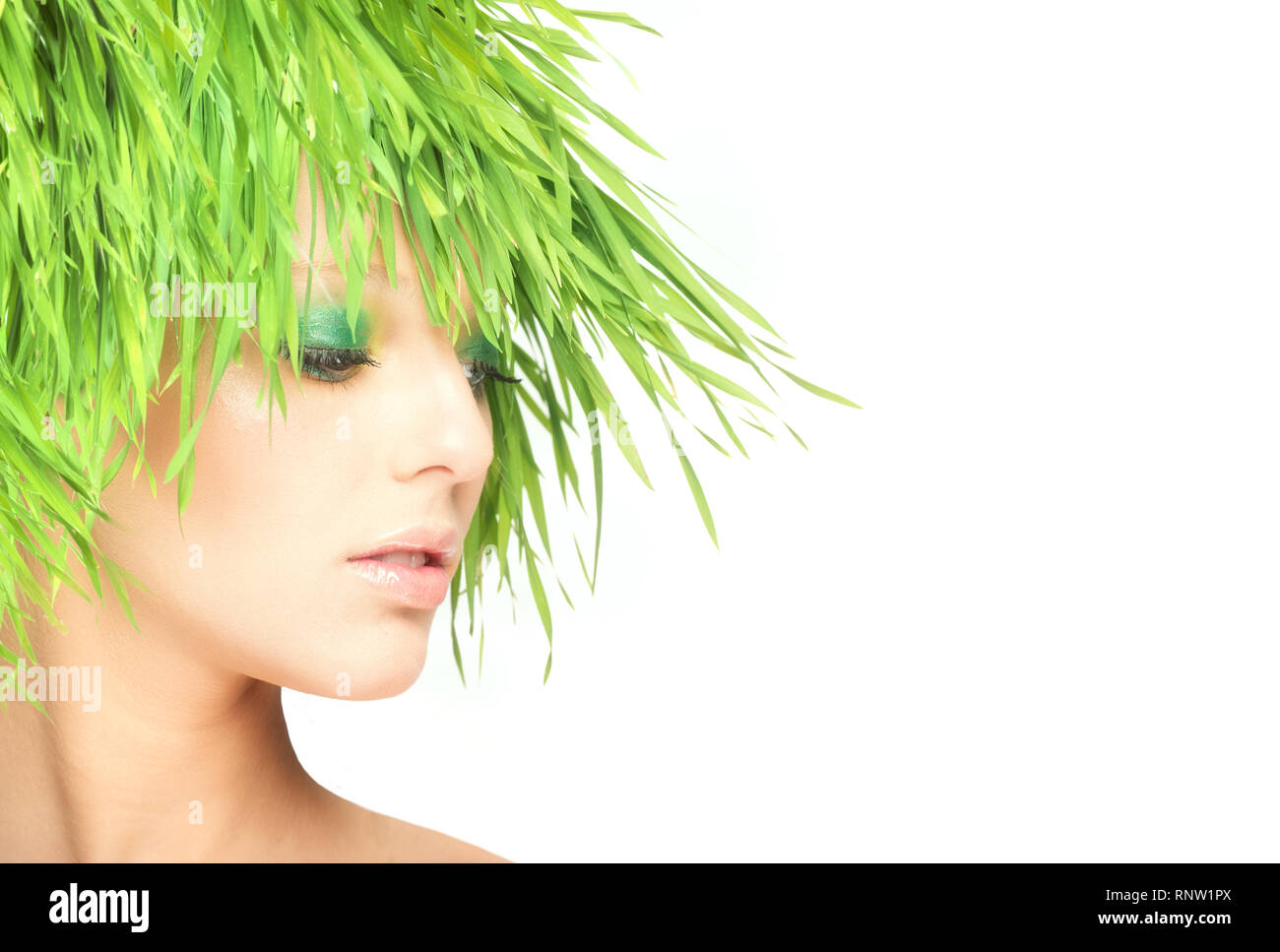 Nature beauty woman with fresh grass hair Stock Photo