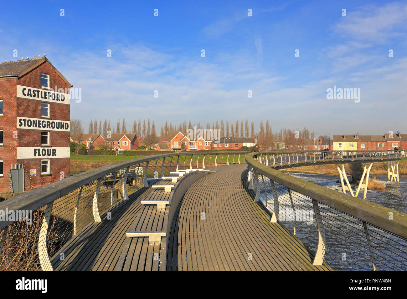 Millennium Bridge over the River Aire by Queen's Mill, Castleford, West Yorkshire, England, UK. Stock Photo