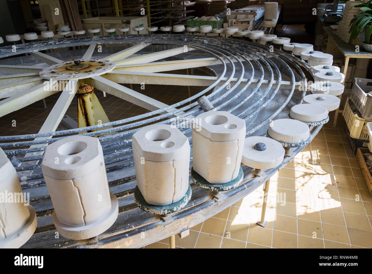 Traditional ceramics pottery on production line in factory Stock Photo