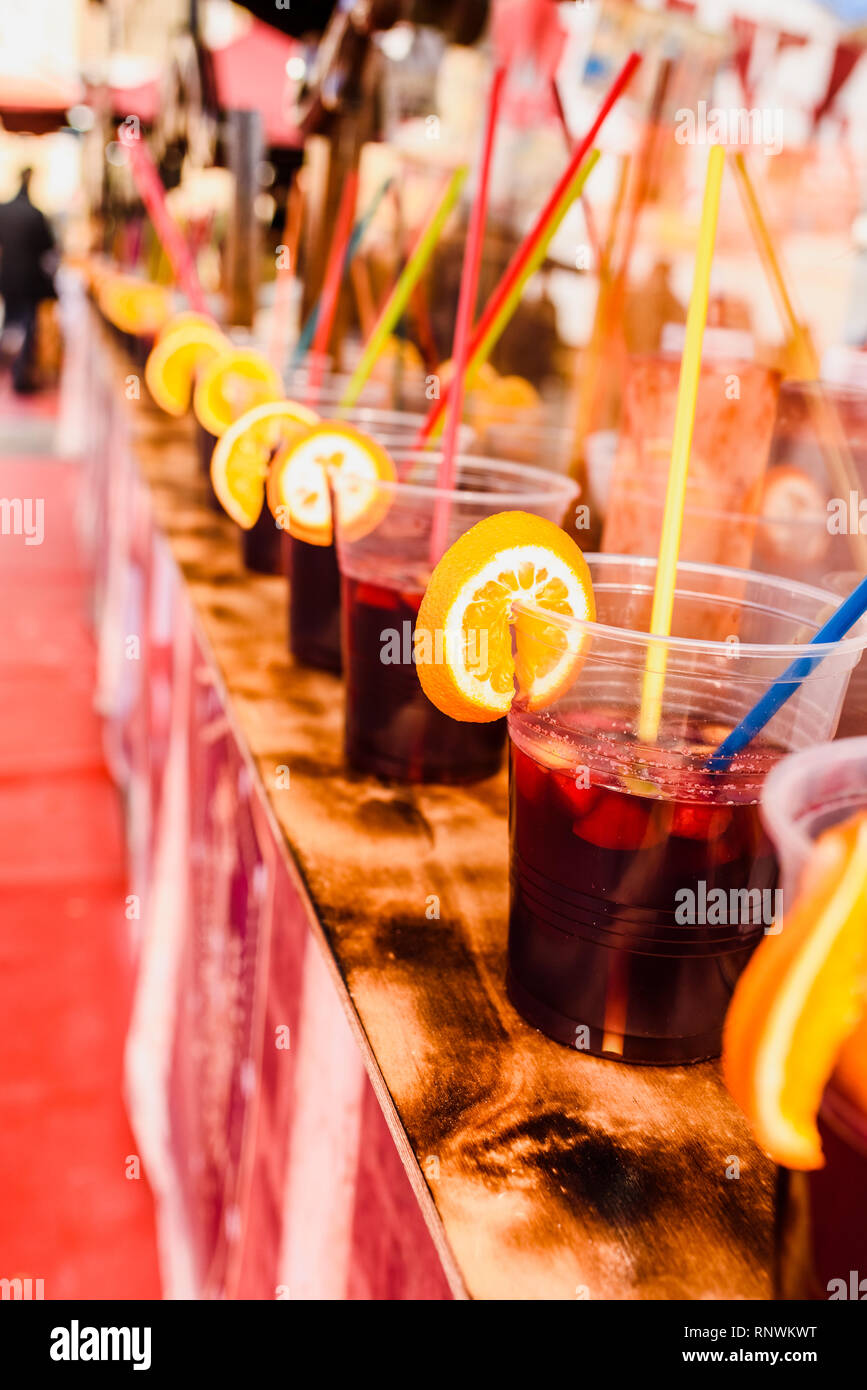 https://c8.alamy.com/comp/RNWKWT/plastic-cups-with-refreshing-drinks-with-alcohol-in-the-bar-of-a-summer-festival-in-spain-RNWKWT.jpg