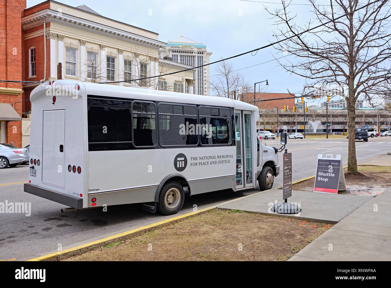 Small passenger tour bus for The National Memorial for Peace and Justice a civil rights organization in Montgomery Alabama, USA. Stock Photo