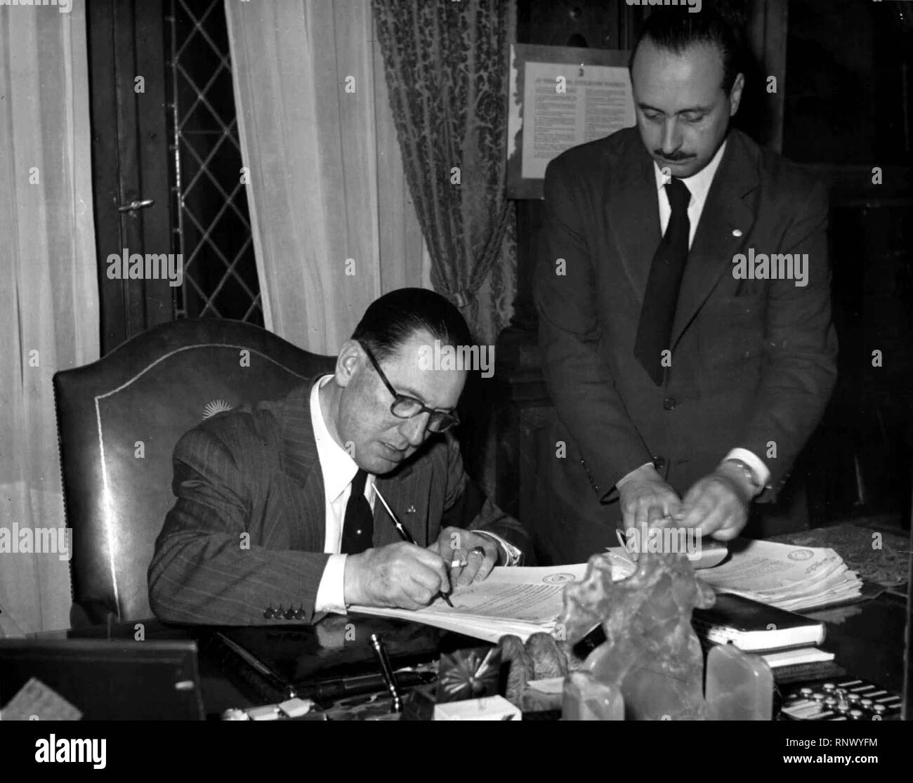 Former Argentinian President, Juan Domingo Peron, working at his presidential office Stock Photo